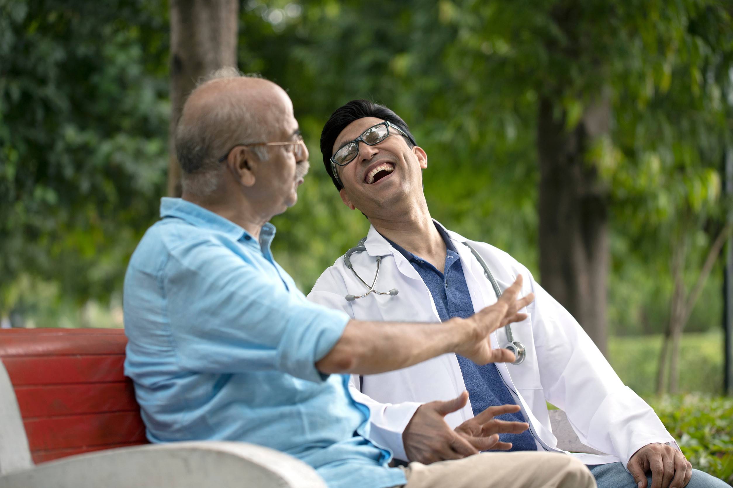 Doctor supporting a senior patient during recovery 