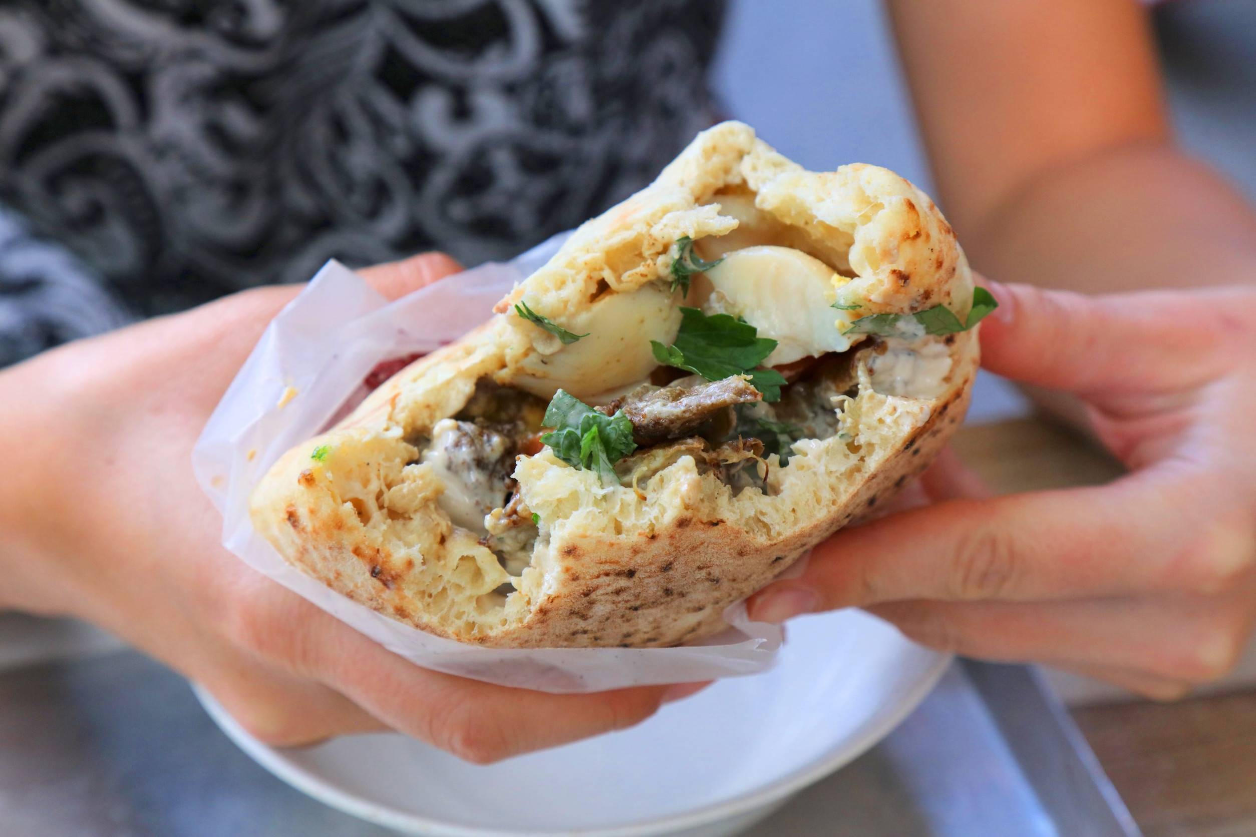 Israeli Cuisine Sabich Sandwich Filled With Fried Aubergine Hard Boiled Egg Amba Sauce And Pickles