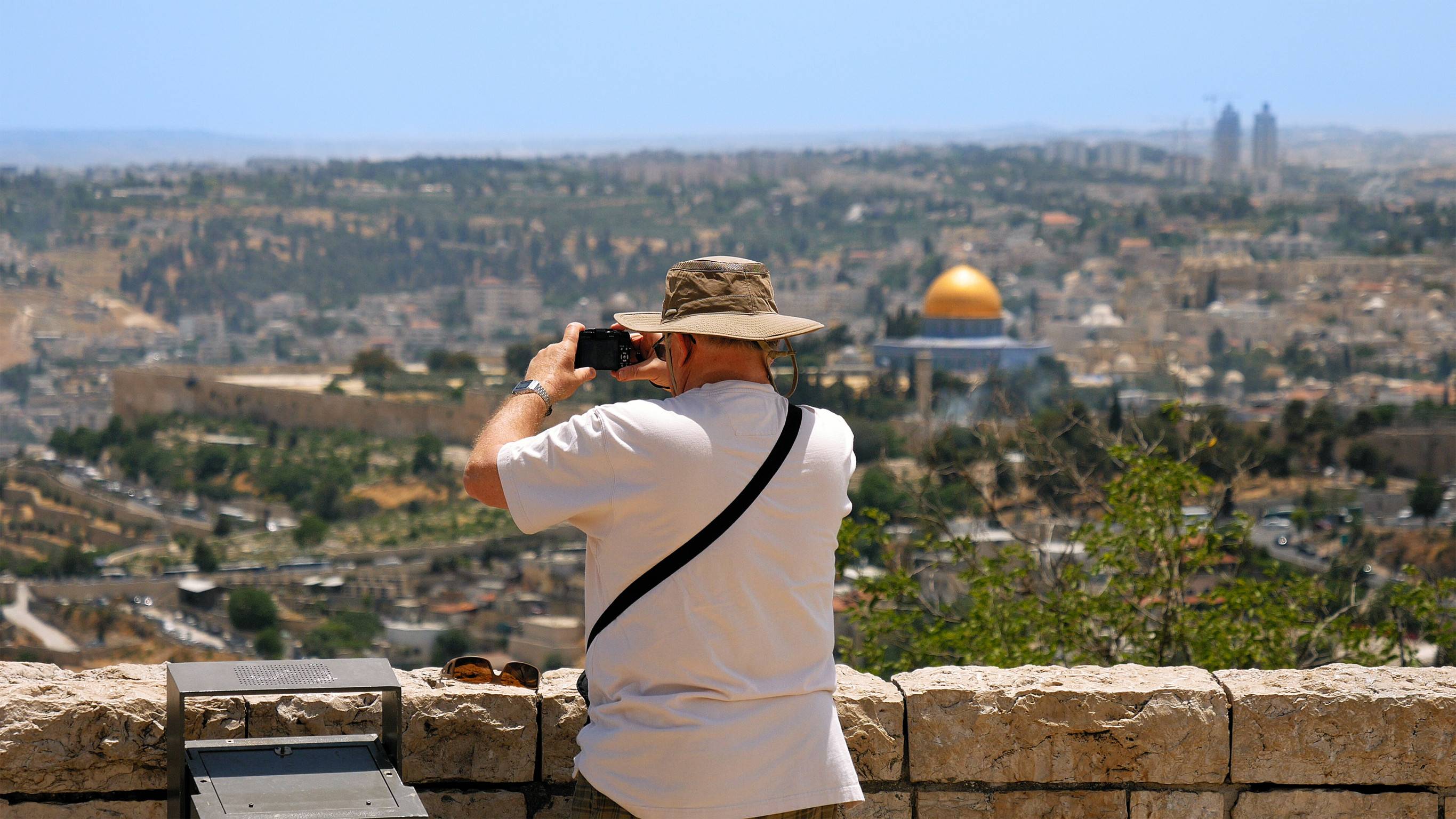 Tourist Photographing Panoramic View Of Jerusalem